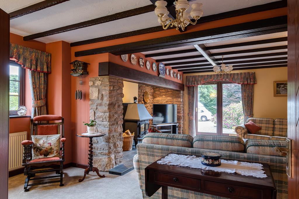 Sitting room with inglenook fireplace