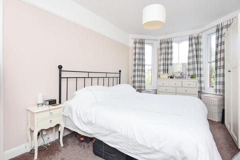 65 Braemar Avenue, London, SW19 8AY