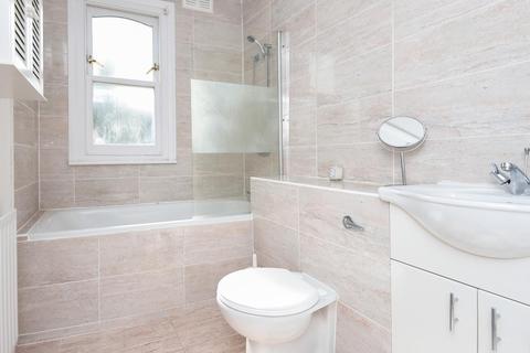 65 Braemar Avenue, London, SW19 8AY
