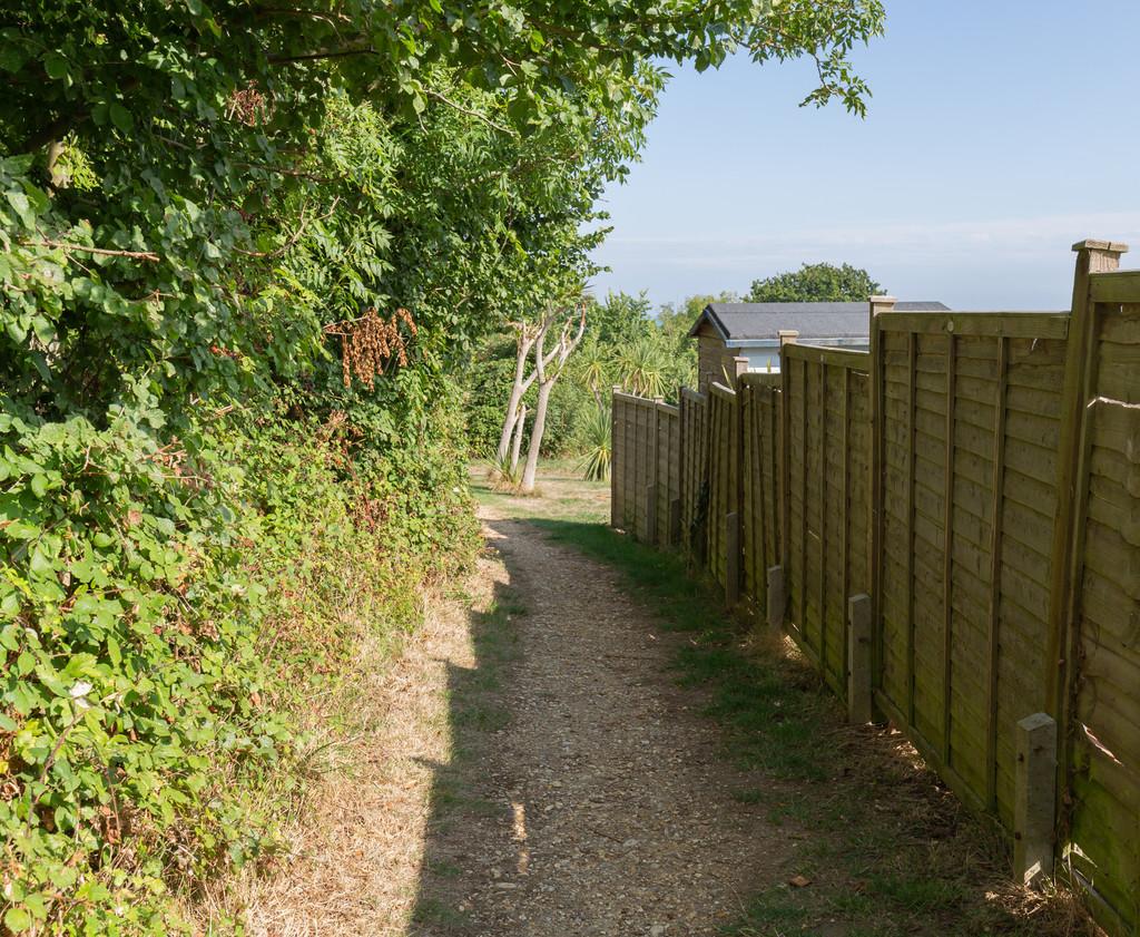Direct access to adjacent footpath leading to the