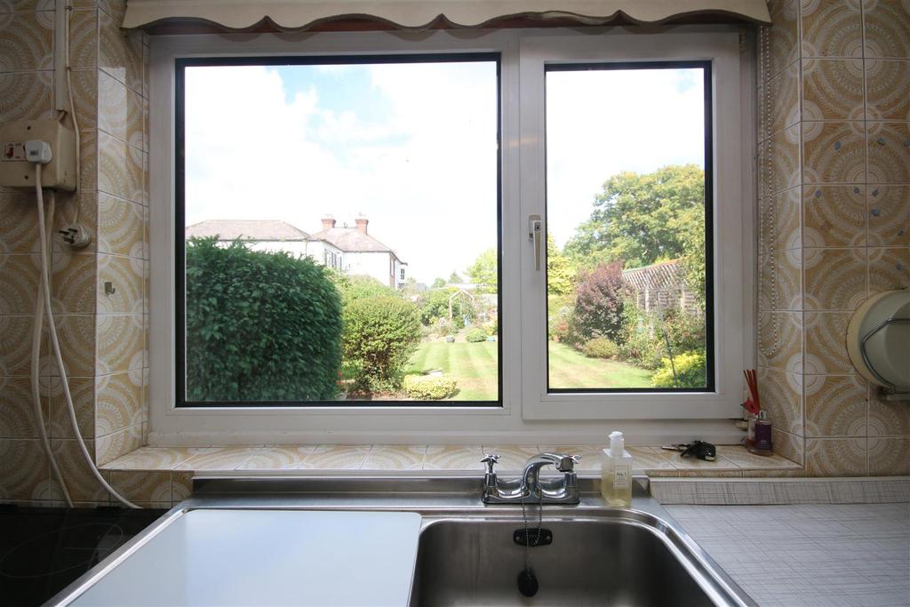 View of rear garden from kitchen: