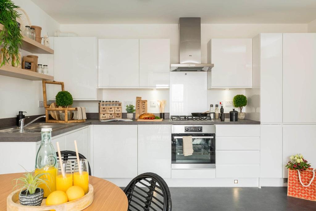 The open plan kitchen has plenty of space for...