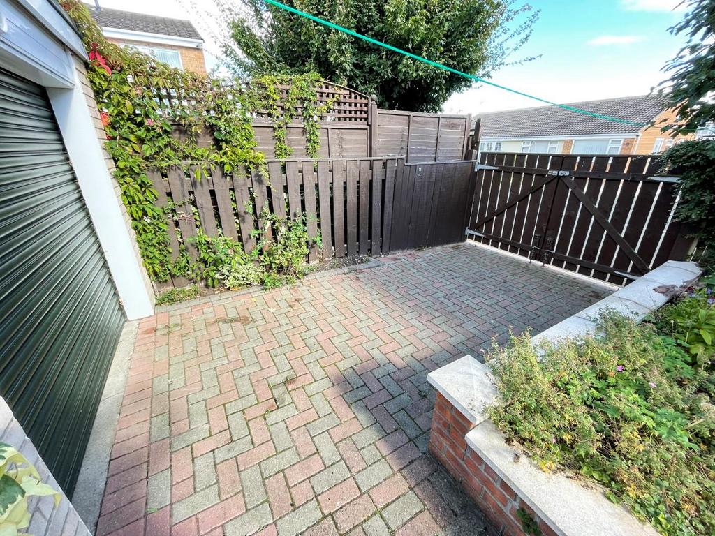 Rear drive and garage