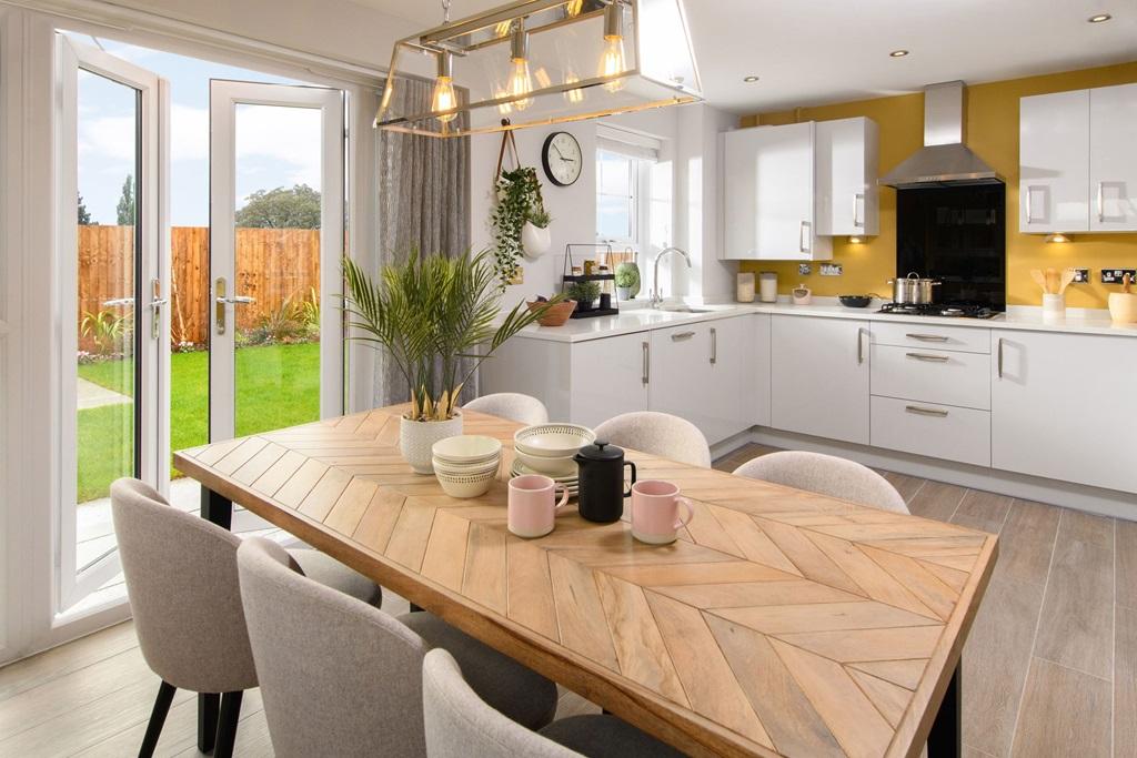 Open plan kitchen/diner in Hesketh with French doors to gardenb