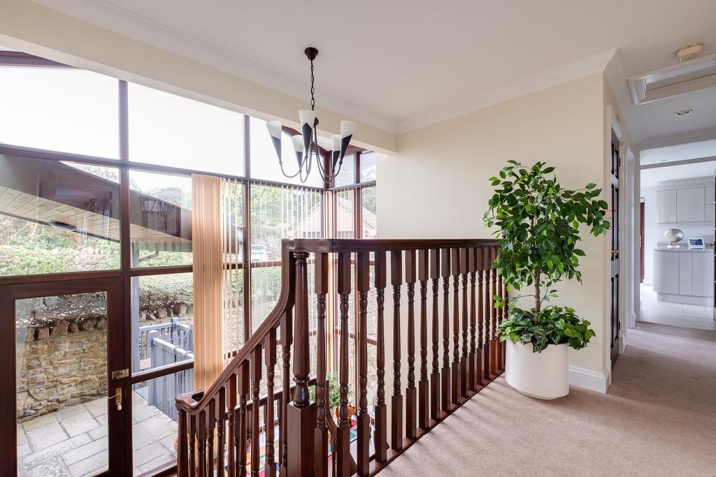 Glazed balconied entrance hallway