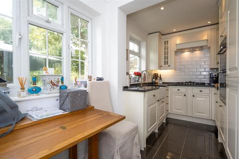 55 Balmoral Crescent, West Molesey, KT8 1QA