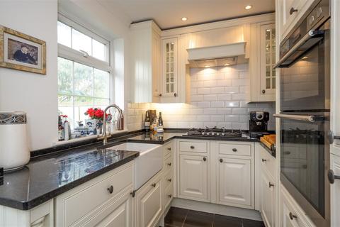 55 Balmoral Crescent, West Molesey, KT8 1QA