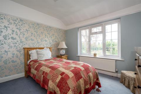 55 Balmoral Crescent, West Molesey, KT8 1QA