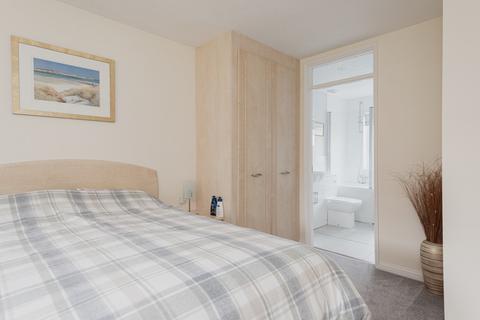 11 Fairholme Crescent, Ashtead, KT21 2HN