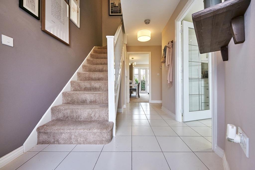 The Flatford has a spacious hallway with under stair storage