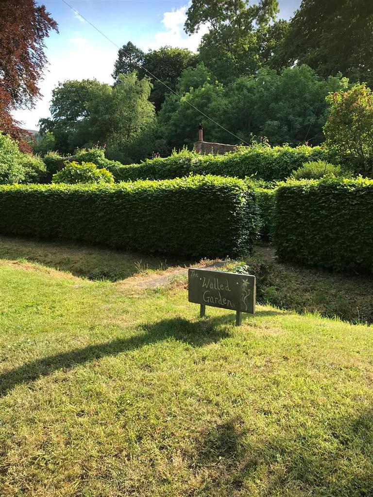 The walled garden in bloom.png