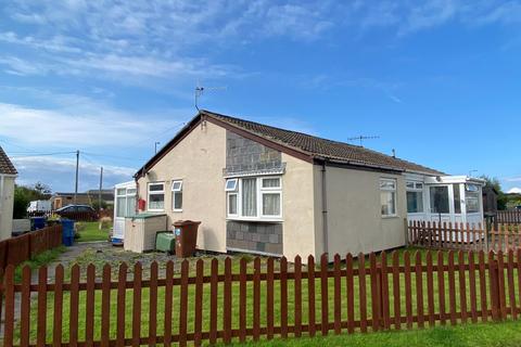 24 Glan Y Mor, Fairbourne, LL38 2BX