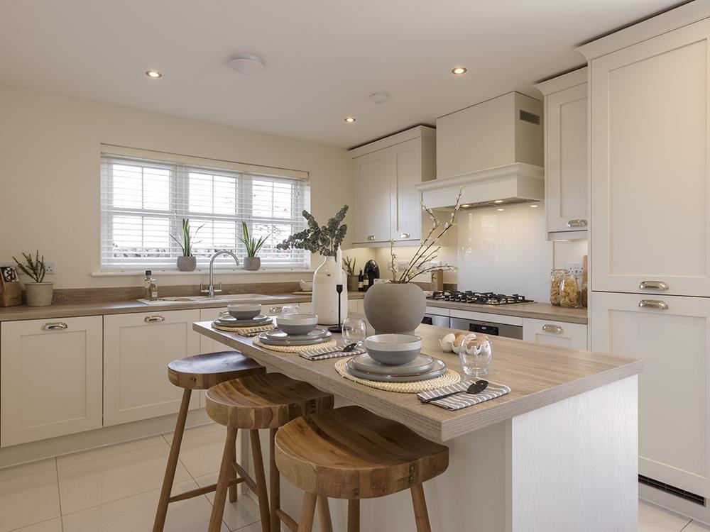 Fully integrated kitchen with stylish breakfast...