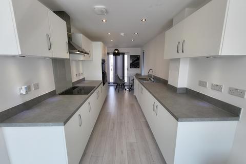 3 bedroom townhouse to rent, Dodie Smith Walk, Stretford, Manchester. M32 0HS