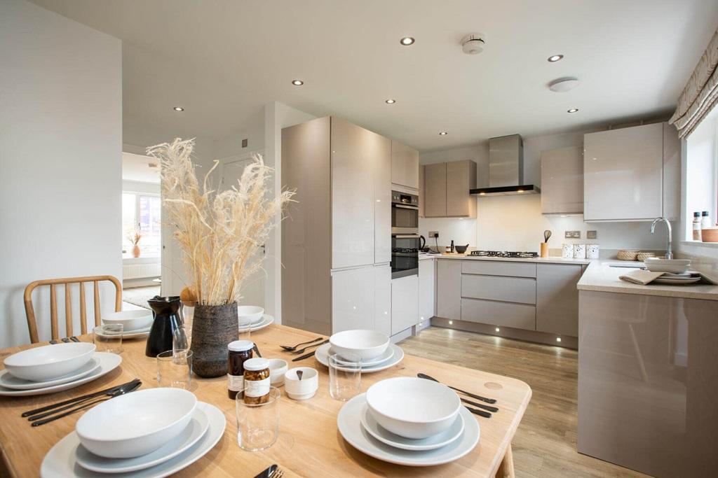 An open plan kitchen and dining area is the...