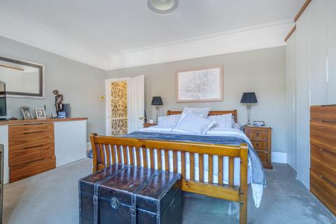 11 The Crescent, London, SW19 8AW