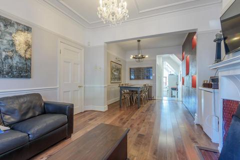 11 The Crescent, London, SW19 8AW