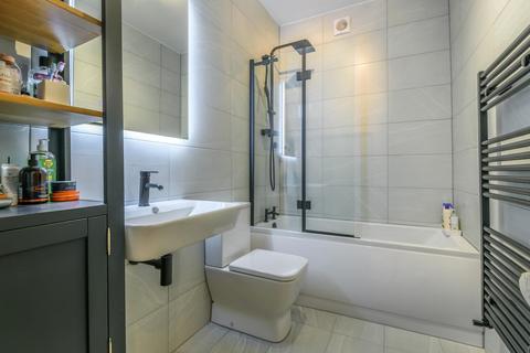 121a Alexandra Road, London, SW19 7JY