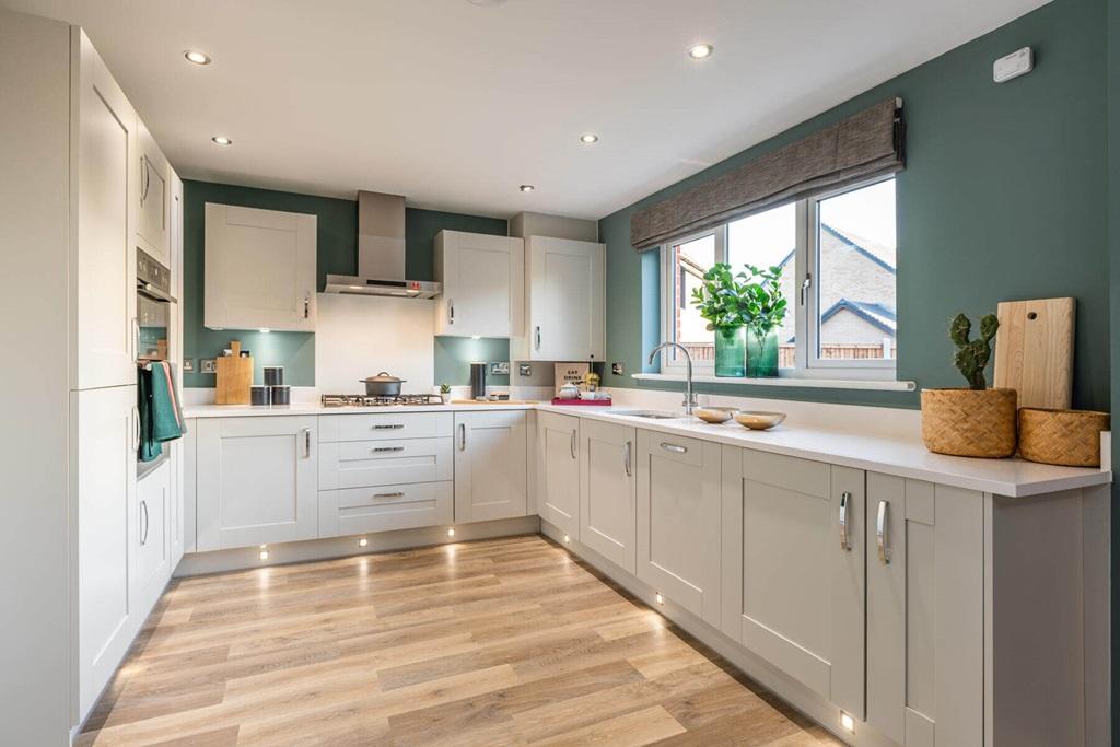 A large kitchen area to the rear of the home