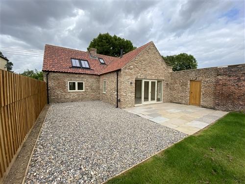 A three bedroom house   To Let