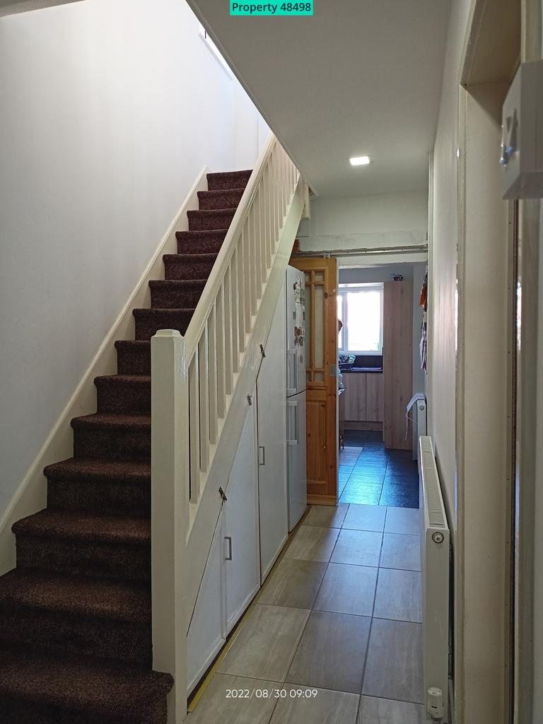 Hallway with under stair storage