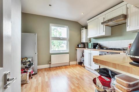 68b Quicks Road, London, SW19 1EX