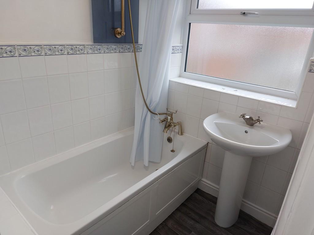 Bathroom with Shower over Bath