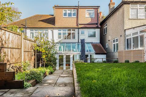 24 Manor Road North, Wallington, SM6 7NT