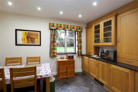 63 Parkside, London, SW19 5NL