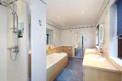63 Parkside, London, SW19 5NL