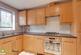 Modern kitchen at the front of the home.