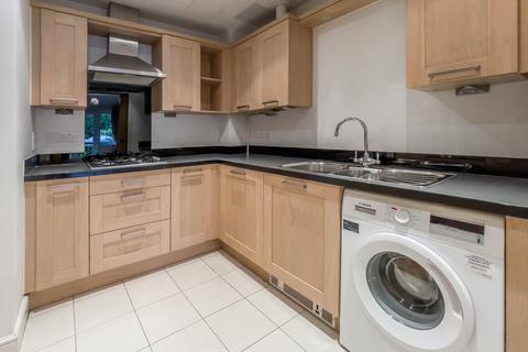 Flat 1, 32 Between Streets, Cobham, KT11 1AF