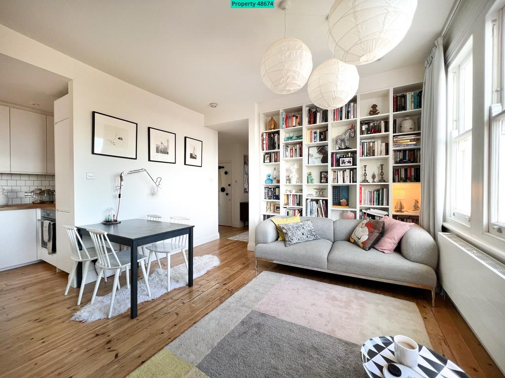 Living Room with Dining Area and Kitchen