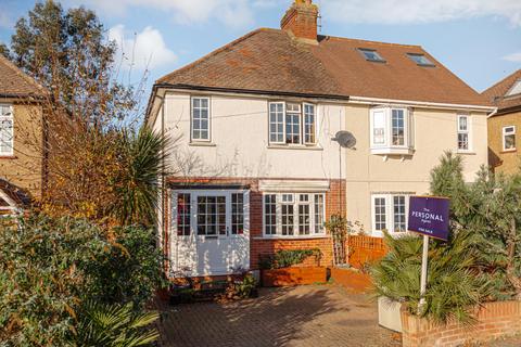44 The Crescent, Epsom, KT18 7LL