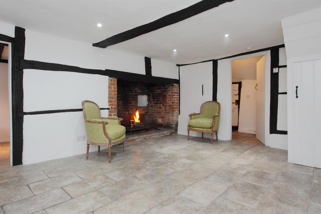 Sitting room and Inglenook, door to kitchen.JPG