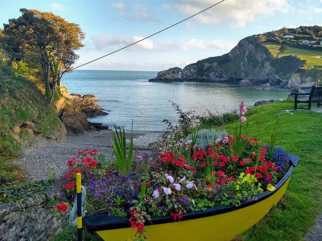 Seacombe Cottage Newberry beach boat flowers.jpg
