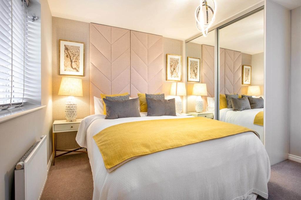 A main bedroom creates a peaceful place away...