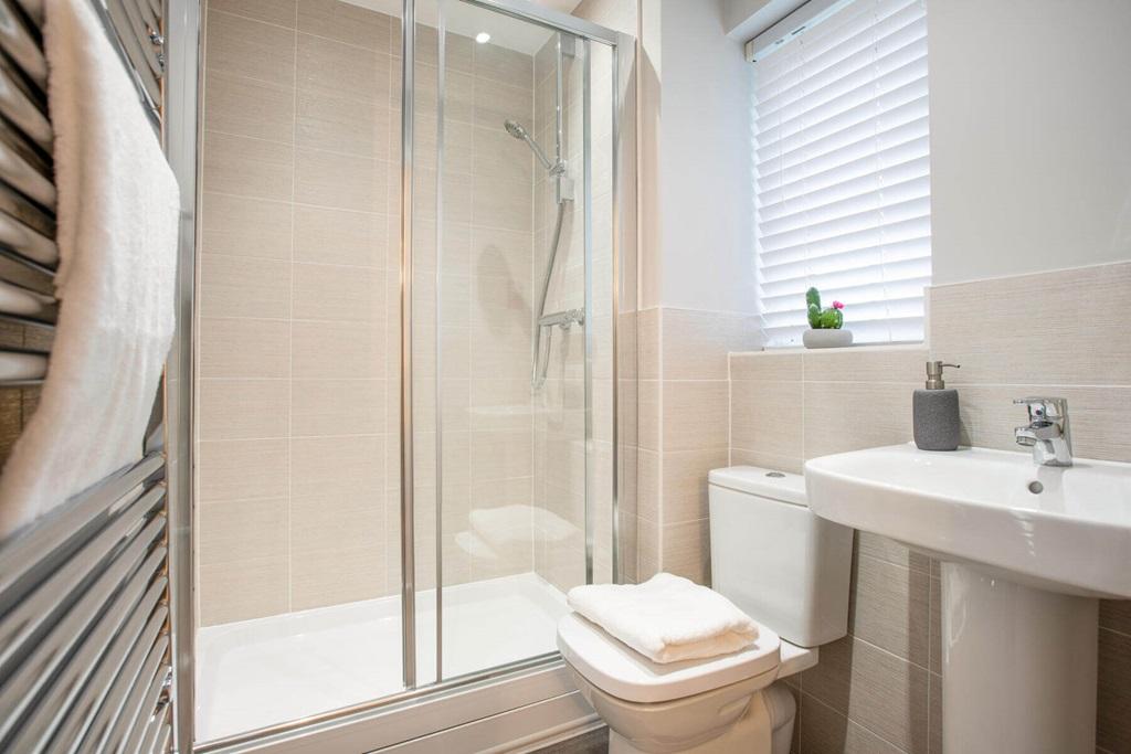 Bedroom 1 also hosts a private en-suite shower...