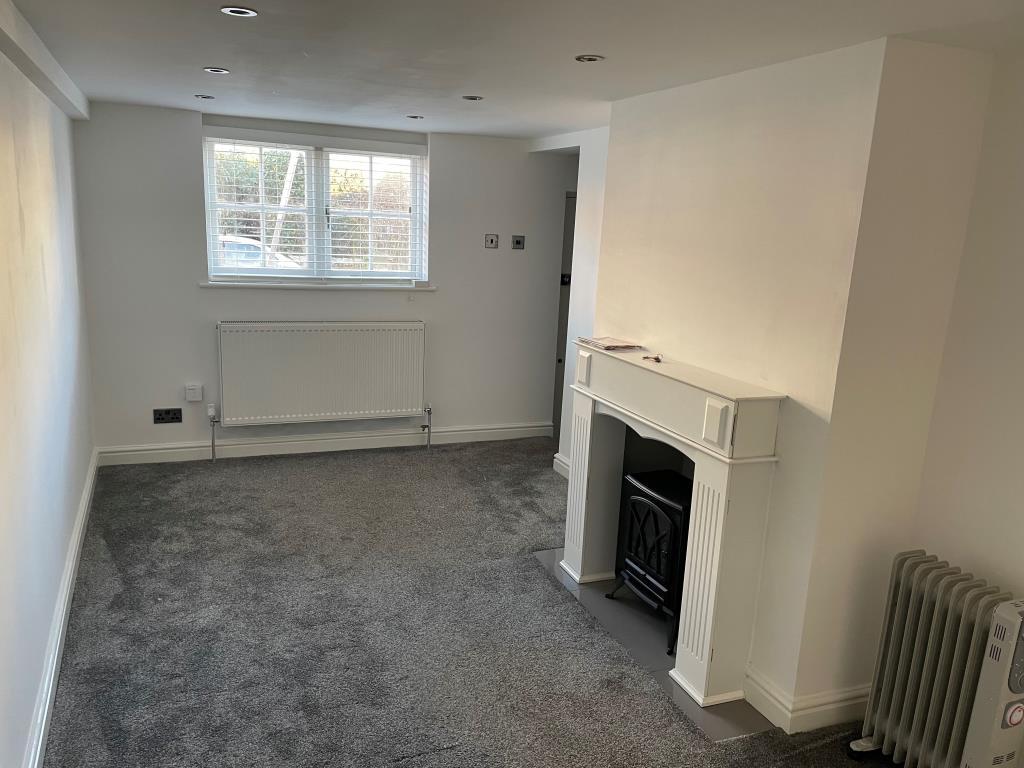 View of living room with fireplace