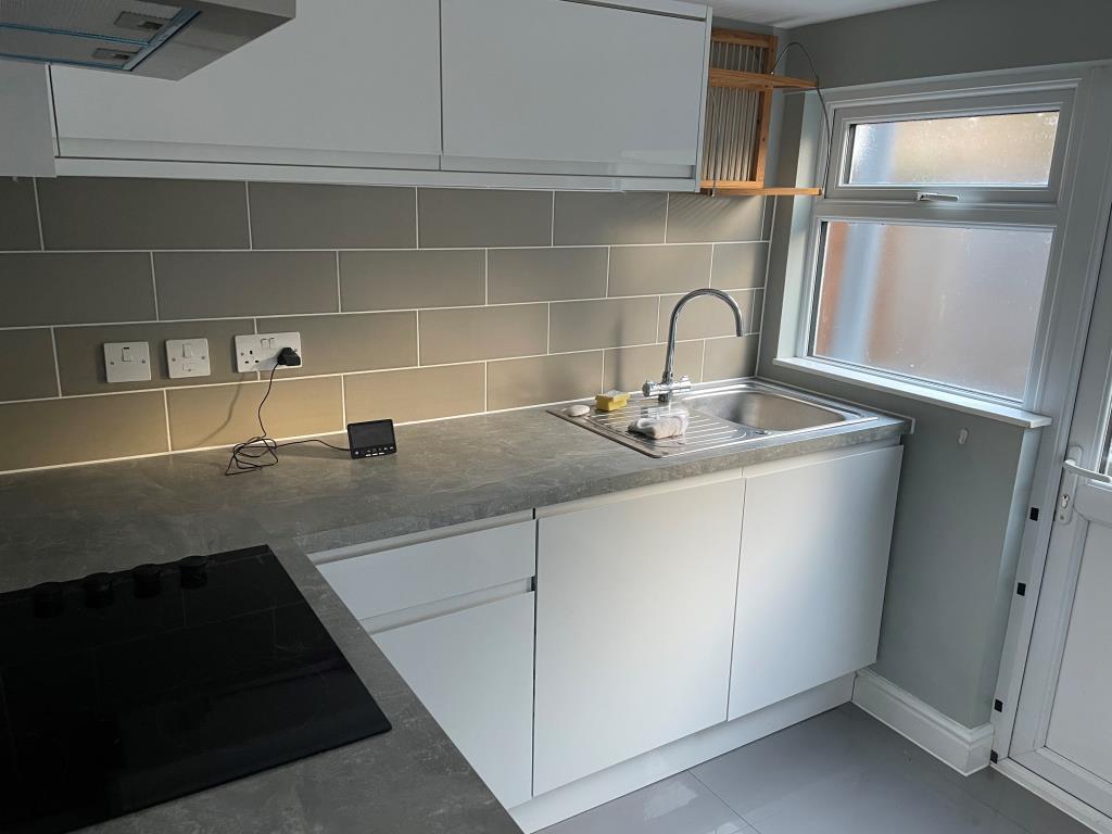 View of contemporary kitchen with fitted units