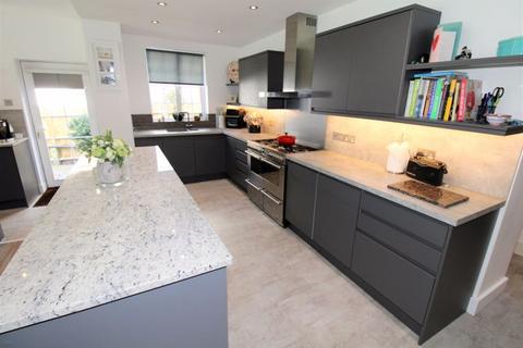 15 Fiddicroft Avenue, Banstead, SM7 3AD