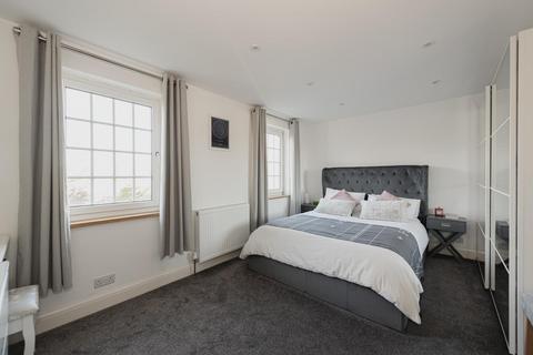 79 Dorking Road, Epsom, KT18 7JU