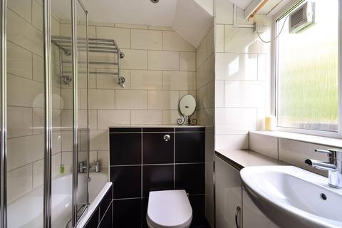 125 Whitlock Drive, London, SW19 6SH