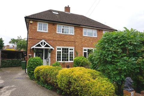 4 Bramham Gardens, Chessington, KT9 1NG
