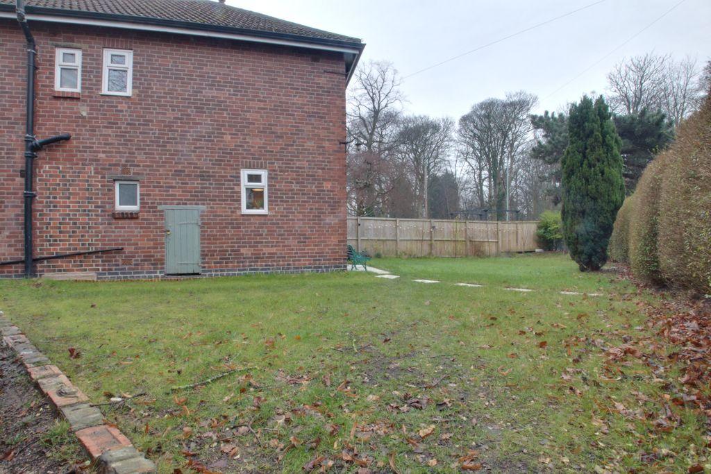 Side and front gardens.