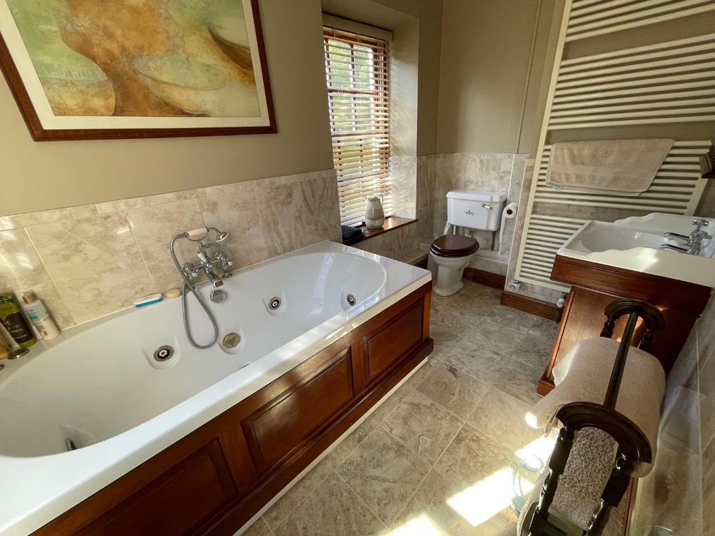 En-suite bathroom to master bedroom