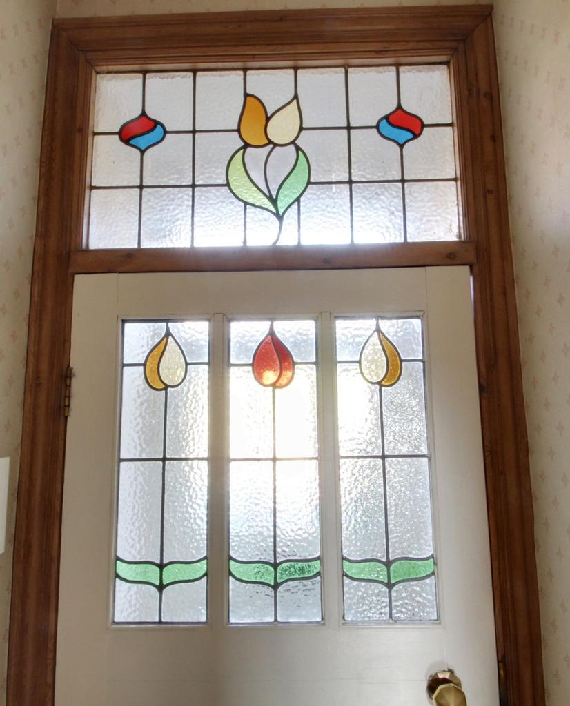 Leaded and stained glass entry door.