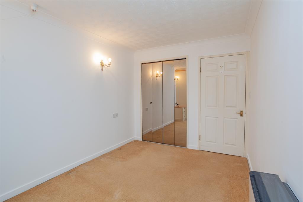 View from bedroom window towards wardrobes