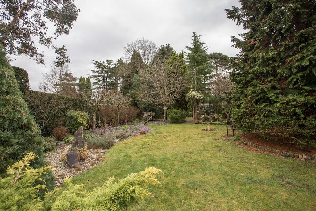 Long secluded well stocked gardens