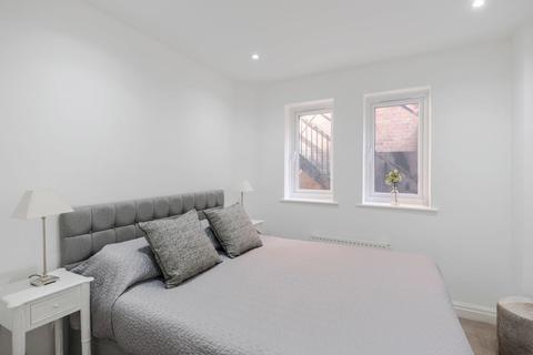 2 bedroom house to rent, Romney Mews, London, W1U